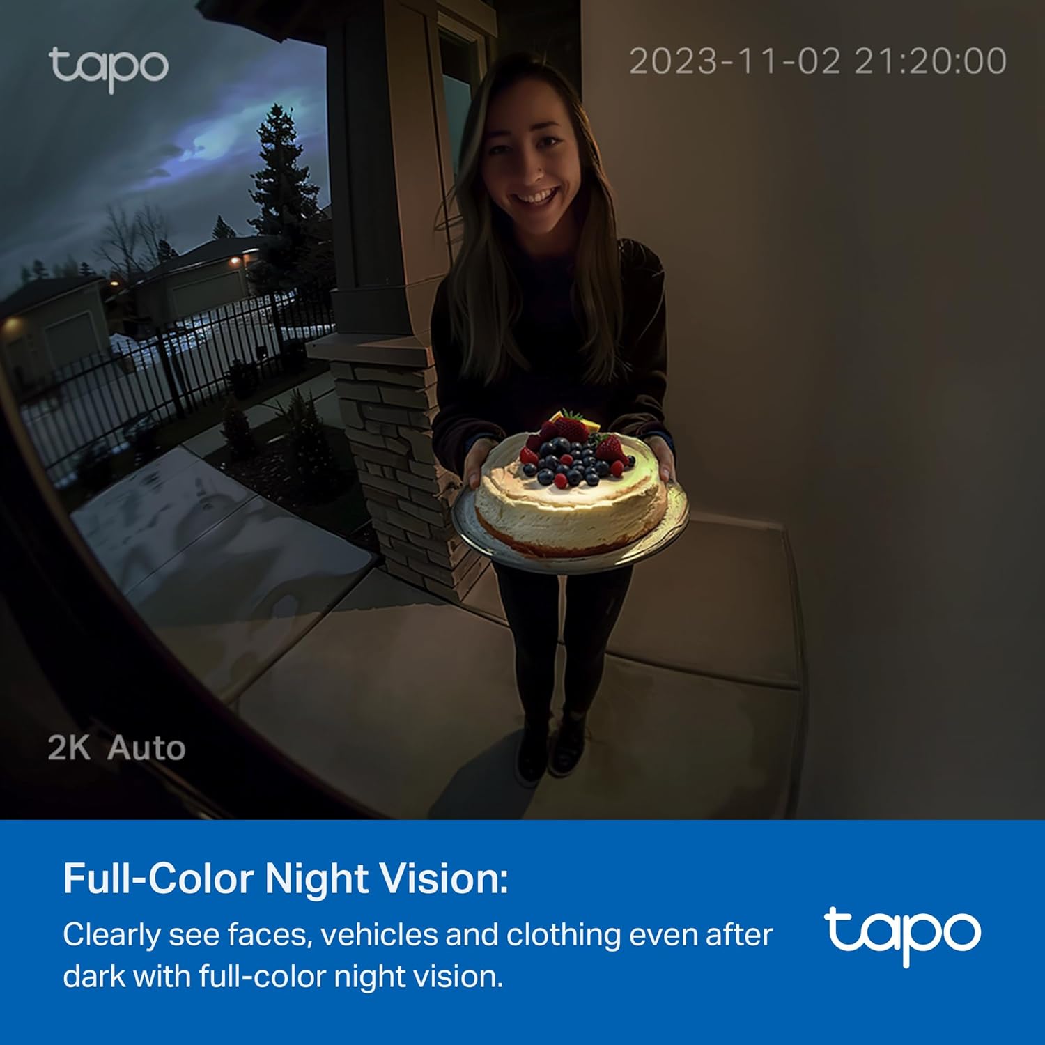 Tapo D210 full-color night vision with integrated LED spotlight illuminating visitor at night