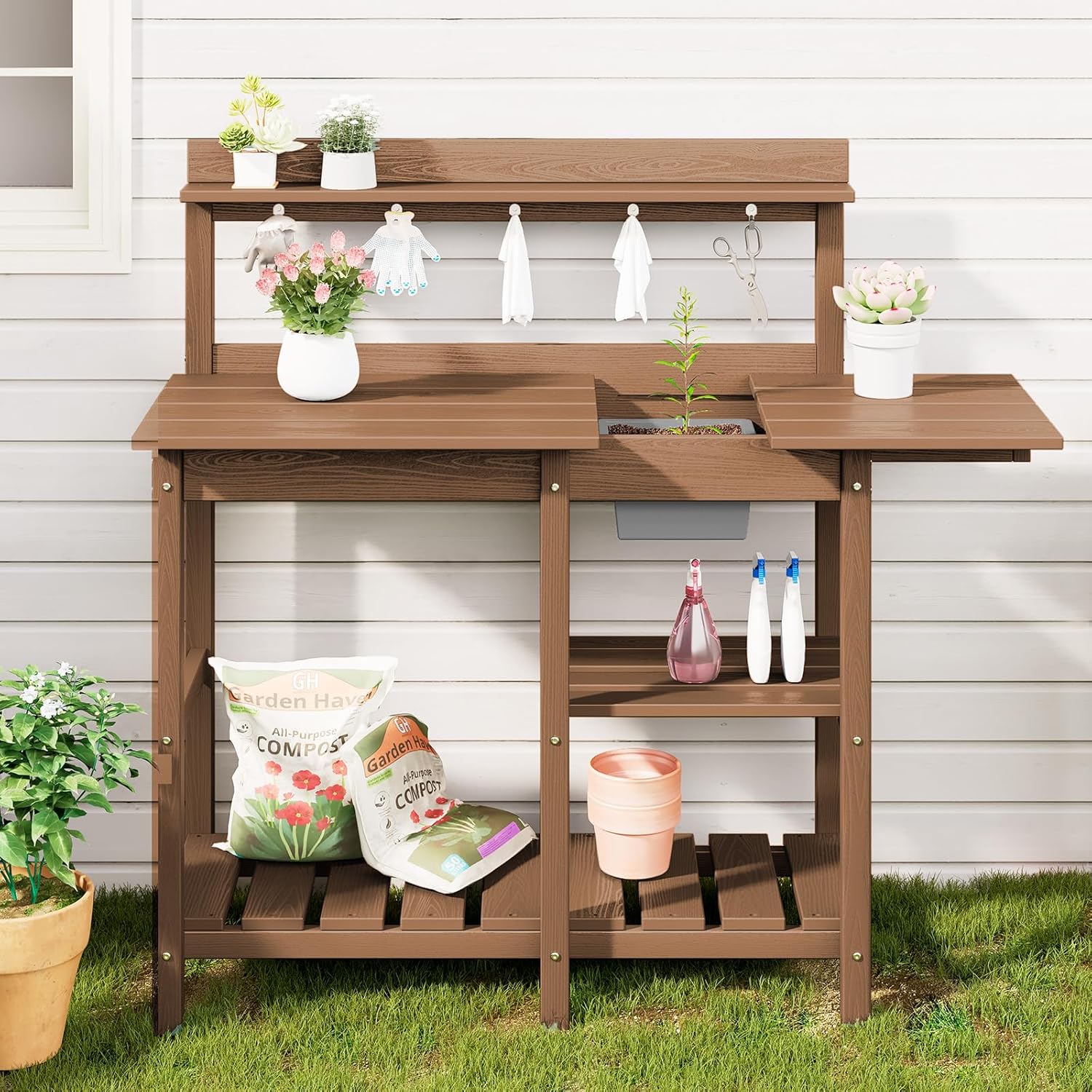 4-tier storage organization system on outdoor potting bench with shelves and hooks