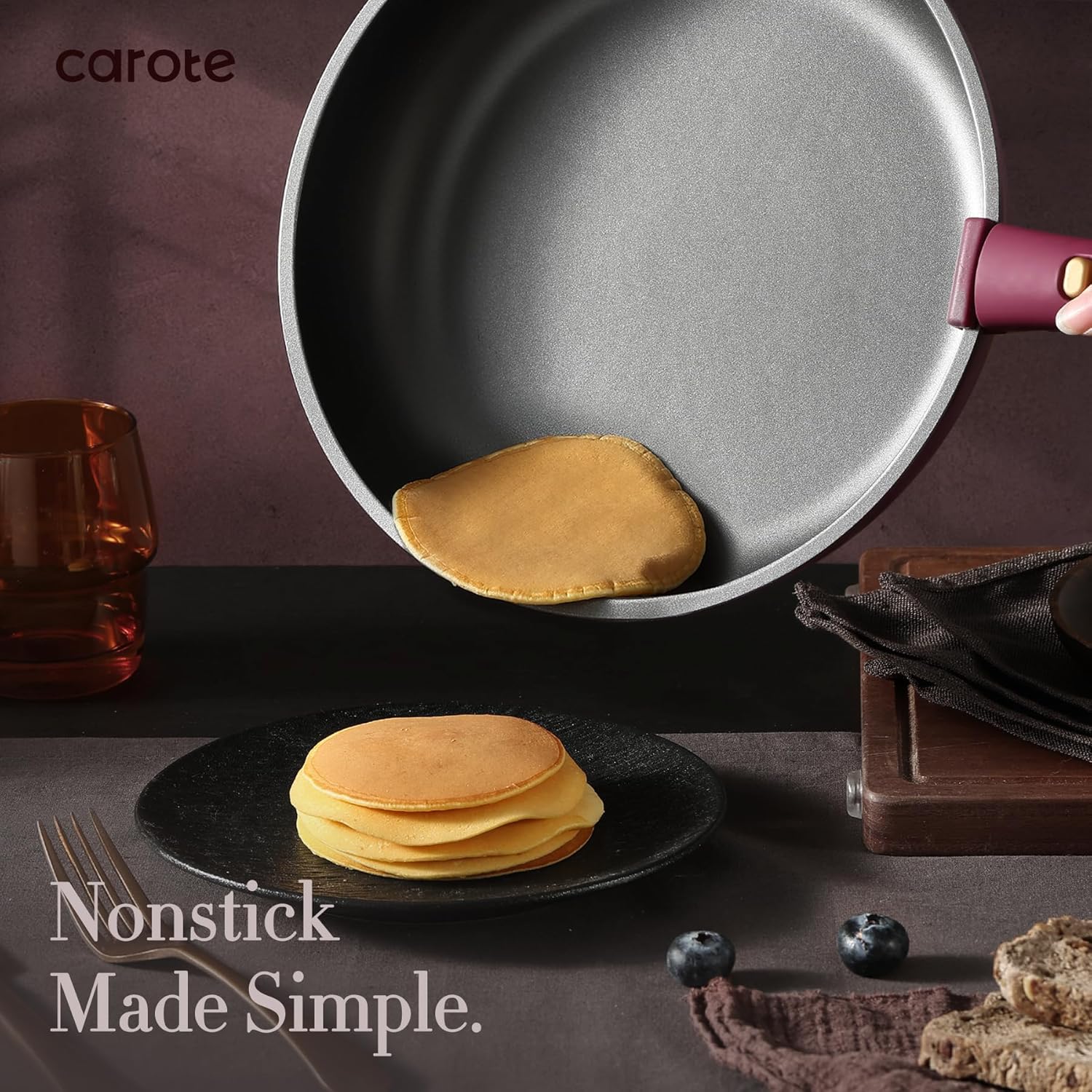 CAROTE nonstick cookware set detachable handle locking mechanism closeup
